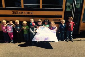 Kids standing in front of school bus Gorham Printing