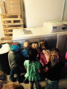 Kids from Centralia College Lab School checking out the printer Gorham Printing