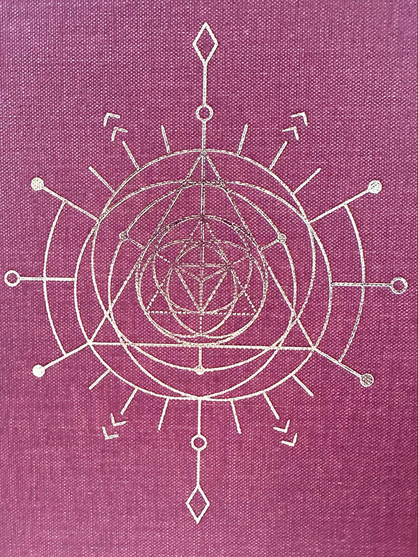 gold foil stamp on red background